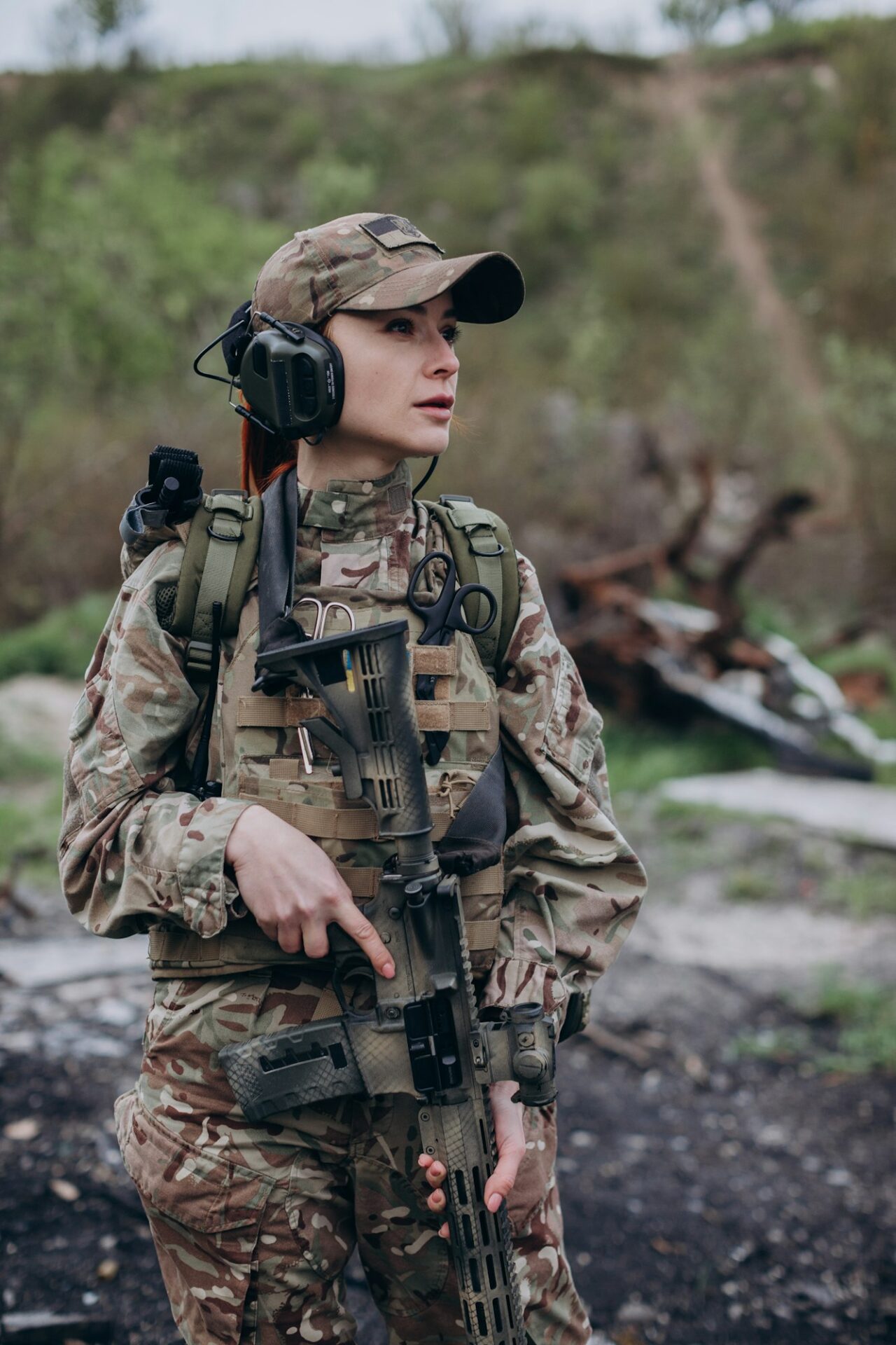 Armed Ukrainian military woman with a rifle